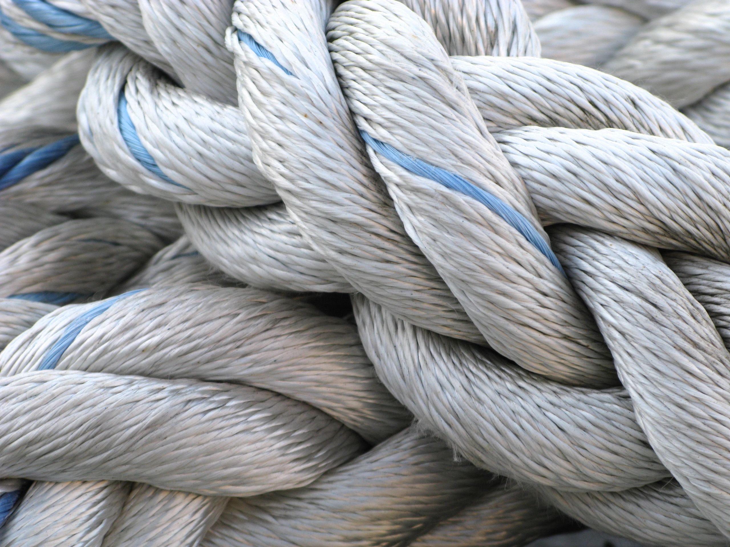 Nautical rope at a marina representing marine safety equipment