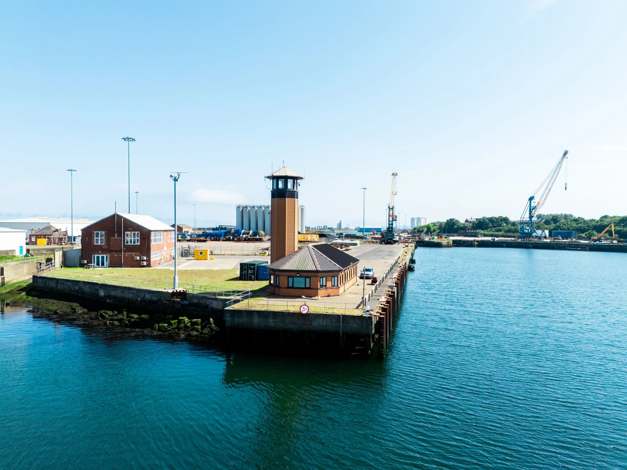 Port cranes supporting deck and engine stores logistics
