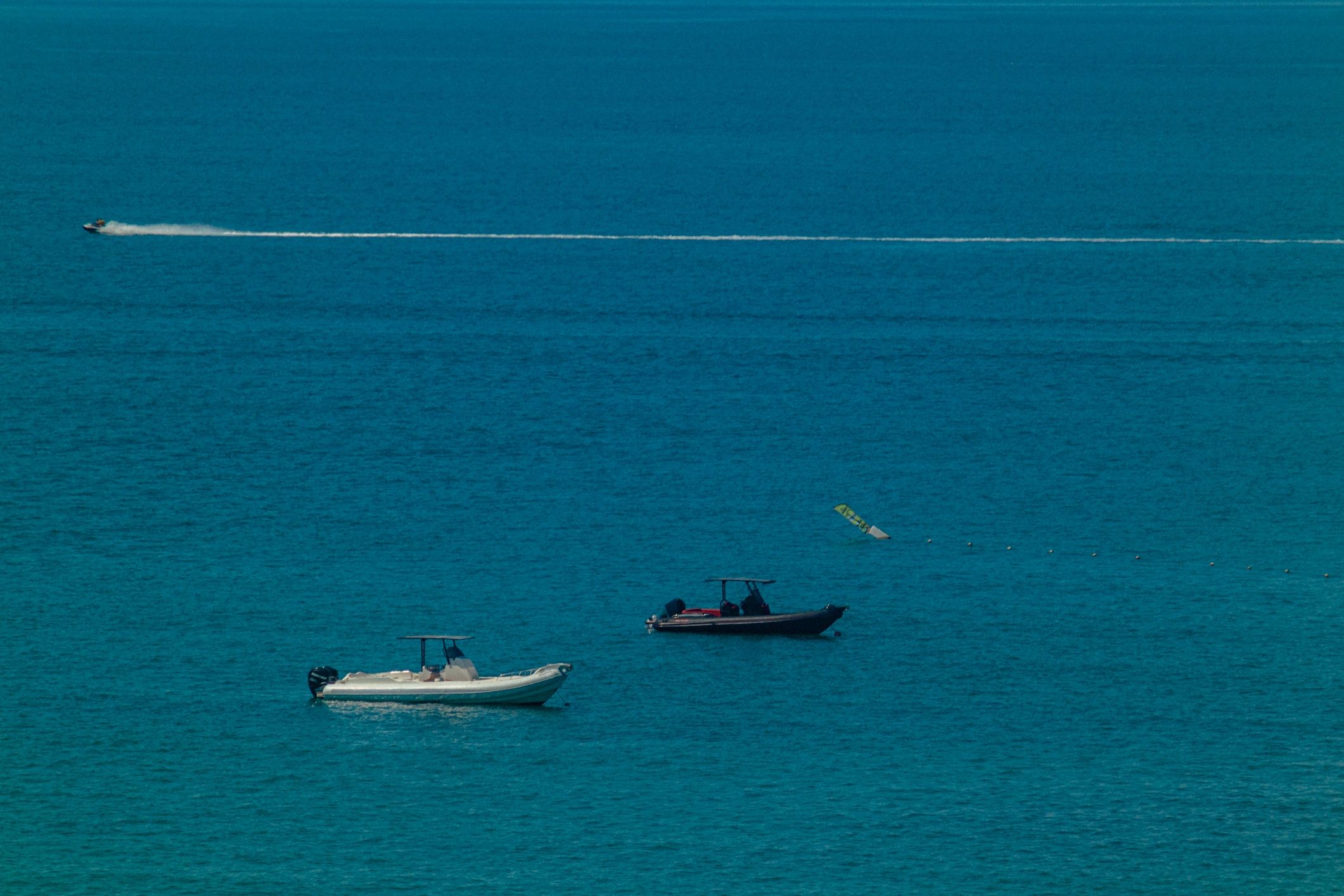 Marine vessels on water representing safety equipment support
